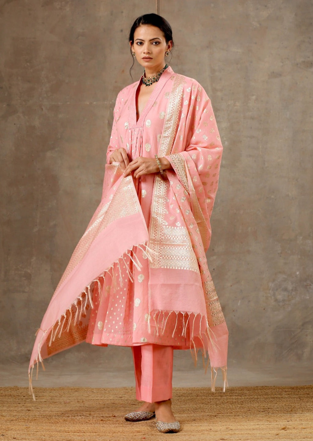 Bbaawri's Chanderi Silk Kurta featuring 5 kalis adorned with delicate buttas. This elegant piece seamlessly combines traditional craftsmanship with modern style, offering a timeless look. Elevate your wardrobe with the richness of Chanderi Silk and the grace of intricate buttas, creating a perfect blend of tradition and contemporary fashion.