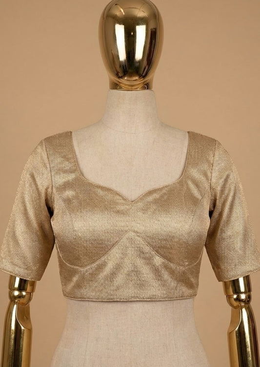 
Banarasi silk weave blouse, gold silk blouse, padded Banarasi blouse, back closure blouse, readymade silk blouse, festive saree blouse, wedding silk blouse, luxury Indian blouse.