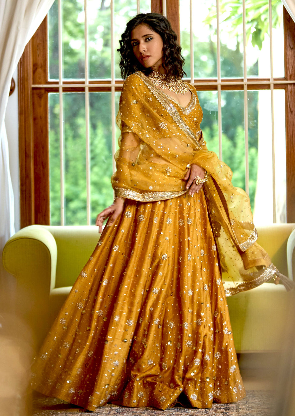 Mastaani Golden Nakshi Lehenga: A Regal Marvel