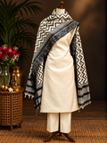 off-white-dress-material-paired-with-geometric-black-dupatta