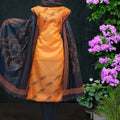 Unstitched Tussar Silk Suit in Orange and Black 