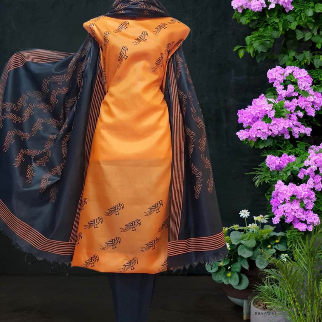Unstitched Tussar Silk Suit in Orange and Black 