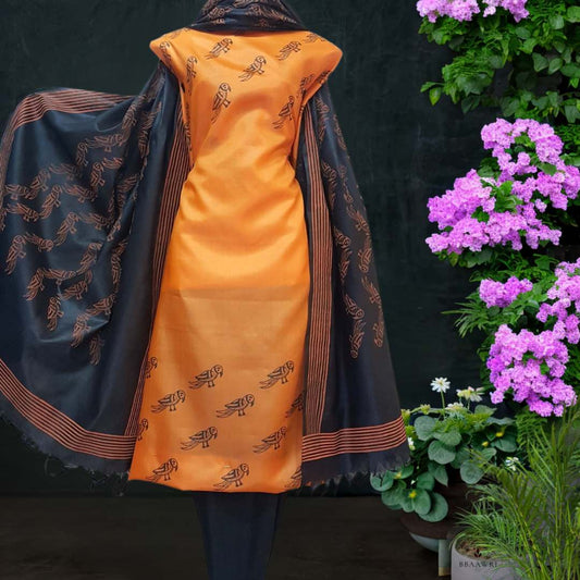Unstitched Tussar Silk Suit in Orange and Black 
